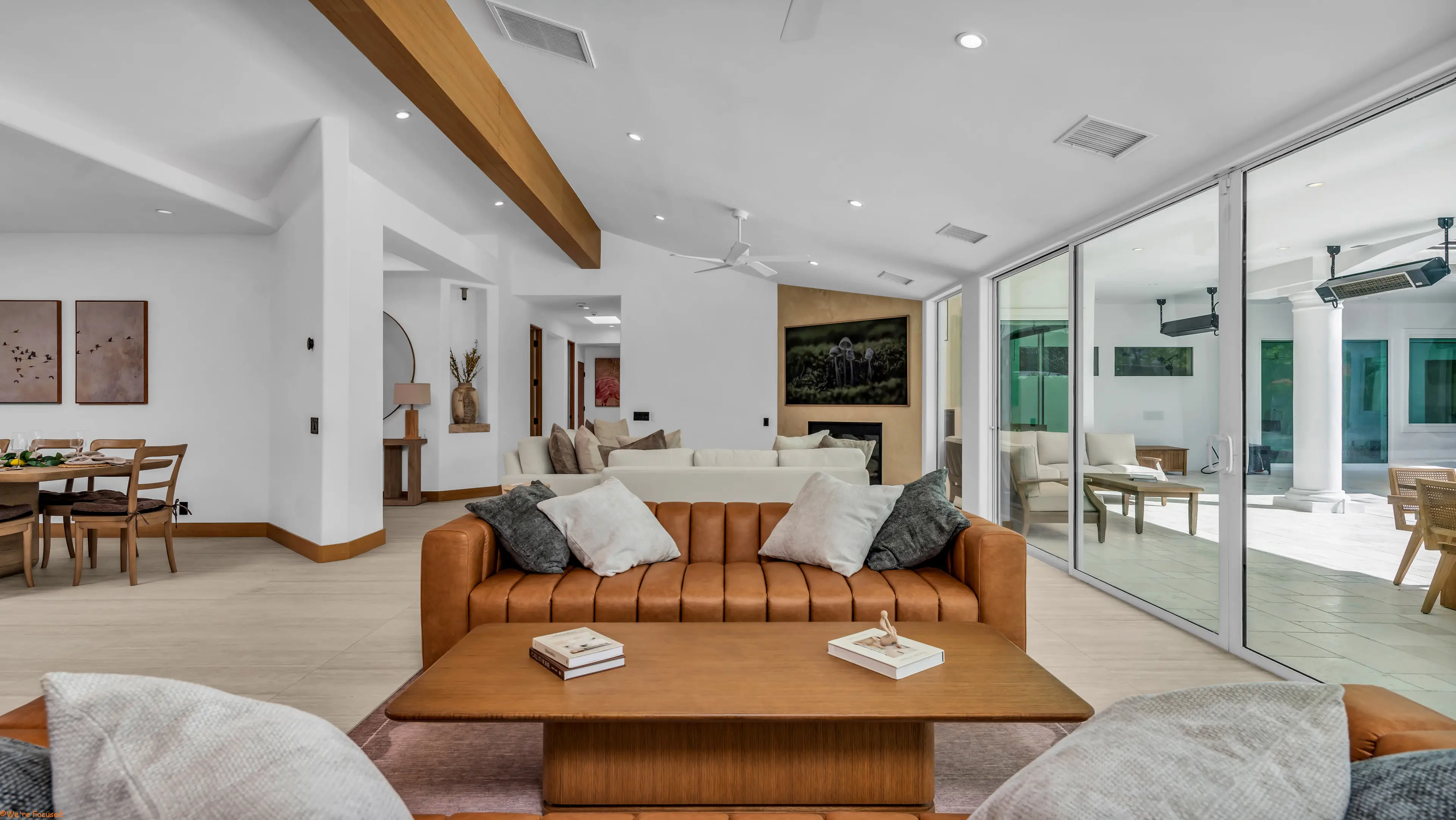 The living room seen from the hallway, opening into the dining area.